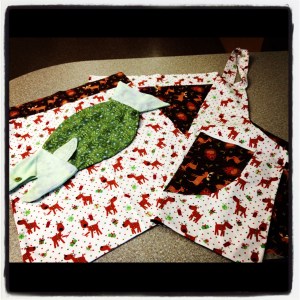 I wanted to make my gifts last year and these were the gift packages I created. Pillowcases, apron, and a fish bag. 